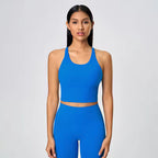 Women's cross-back athletic crop tank top with open back and quick-dry fabric