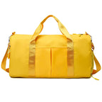 Waterproof gym duffle bag with ventilated shoe compartment and adjustable shoulder strap