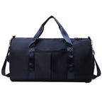 Waterproof gym duffle bag with ventilated shoe compartment and adjustable shoulder strap