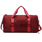 Waterproof gym duffle bag with ventilated shoe compartment and adjustable shoulder strap