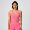 Women's cross-back athletic crop tank top with open back and quick-dry fabric