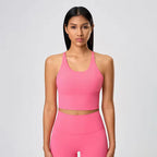 Women's cross-back athletic crop tank top with open back and quick-dry fabric