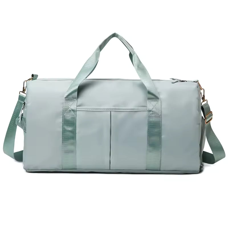 Waterproof gym duffle bag with ventilated shoe compartment and adjustable shoulder strap