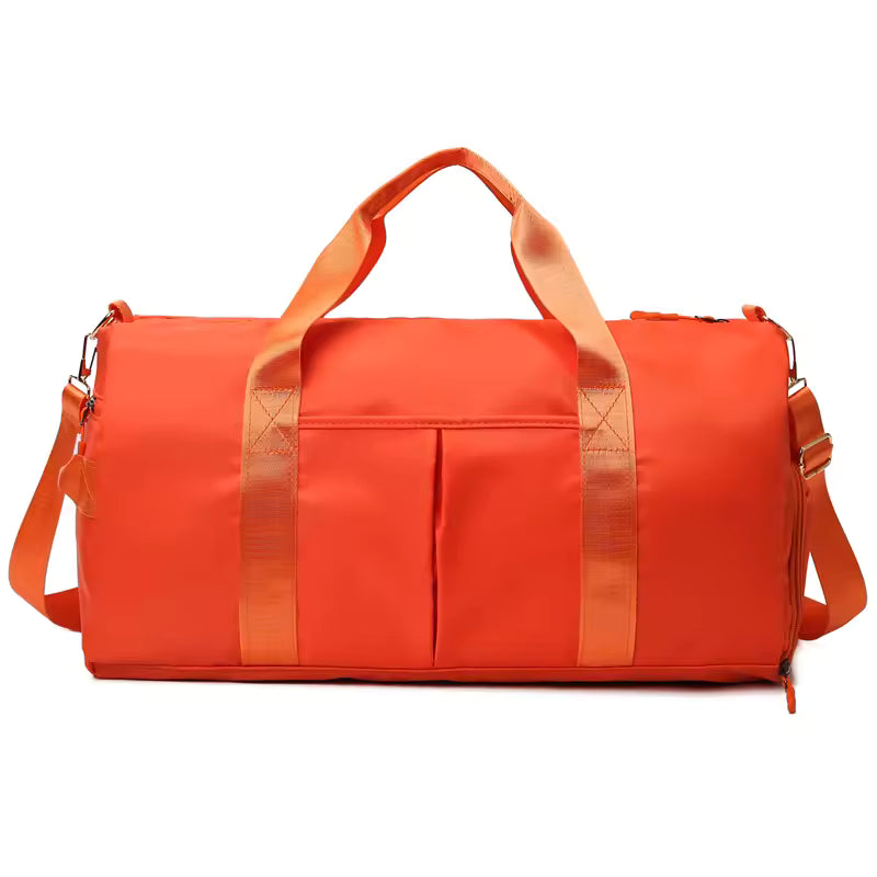 Waterproof gym duffle bag with ventilated shoe compartment and adjustable shoulder strap
