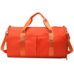 Waterproof gym duffle bag with ventilated shoe compartment and adjustable shoulder strap