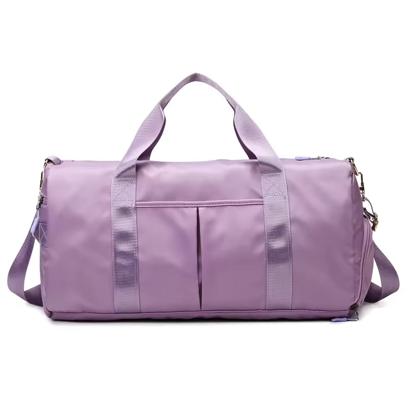 Waterproof gym duffle bag with ventilated shoe compartment and adjustable shoulder strap