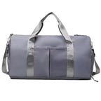 Waterproof gym duffle bag with ventilated shoe compartment and adjustable shoulder strap