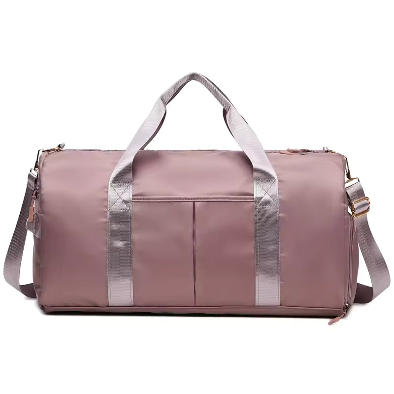 Waterproof gym duffle bag with ventilated shoe compartment and adjustable shoulder strap