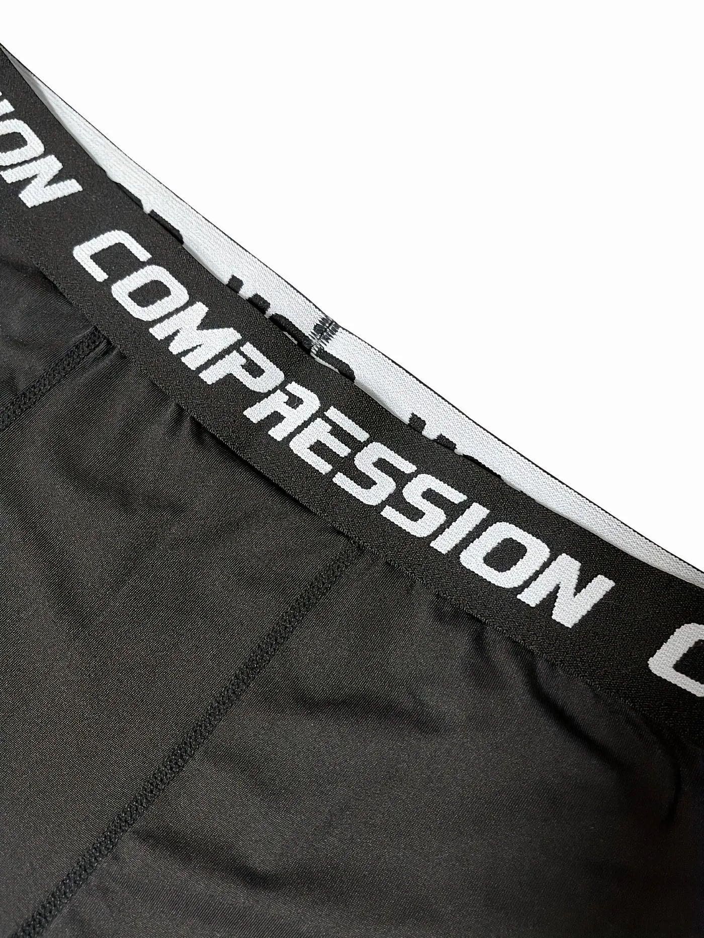 Men's 2-in-1 training pants with built-in compression liner and tapered ankle