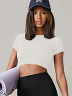 Women's seamless long-sleeve yoga and gym top with compression fit