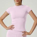 Women's seamless gym crop top with built-in light support bra and removable pads