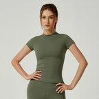 Women's seamless gym crop top with built-in light support bra and removable pads