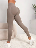 Women's seamless high-waist sculpting leggings with hip-lifting back panel