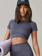 Women's seamless long-sleeve yoga and gym top with compression fit