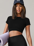 Women's seamless long-sleeve yoga and gym top with compression fit