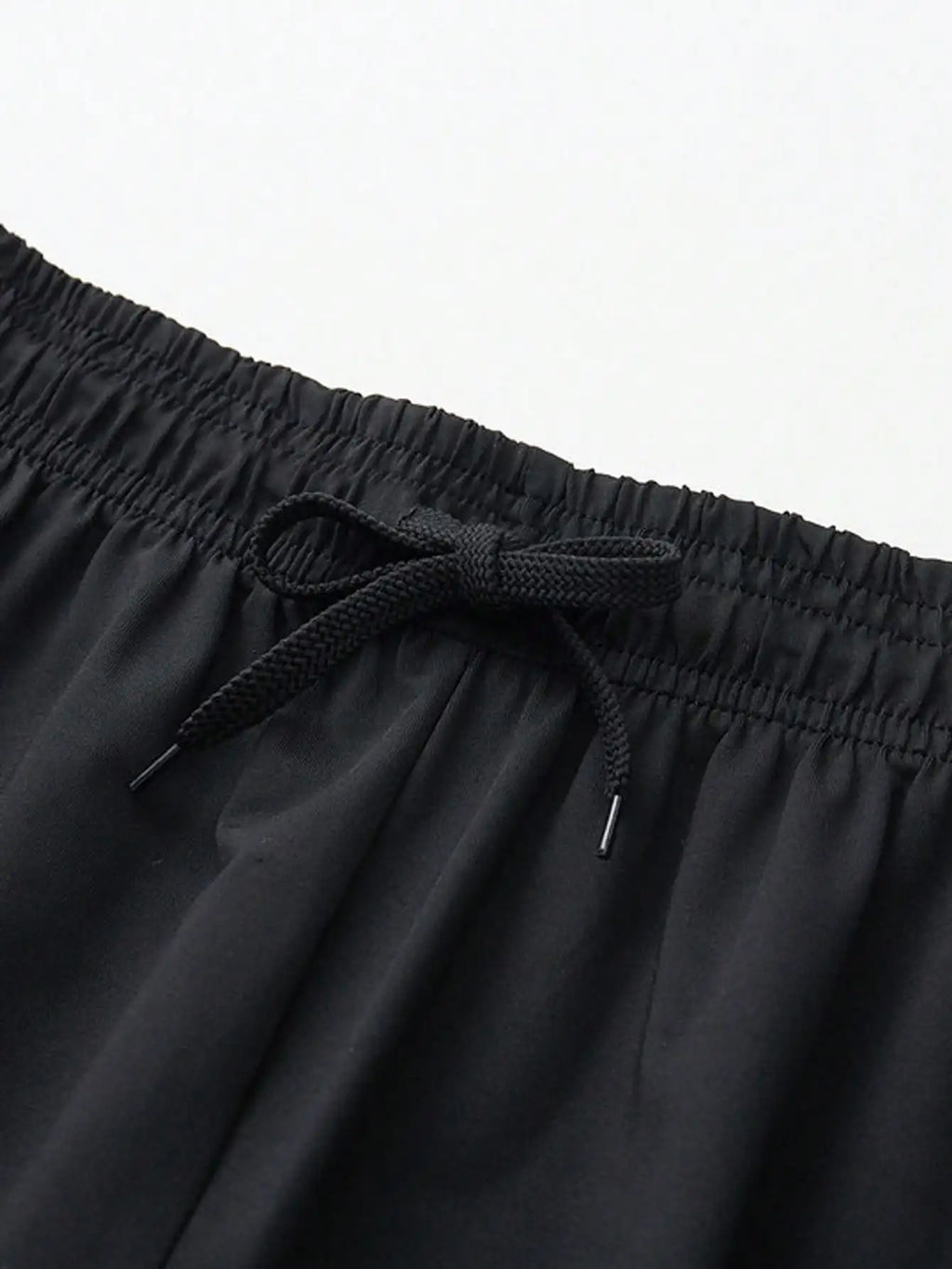 Men's 2-in-1 training pants with built-in compression liner and tapered ankle