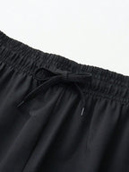Men's 2-in-1 training pants with built-in compression liner and tapered ankle