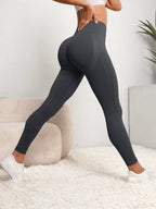 Women's seamless high-waist sculpting leggings with hip-lifting back panel