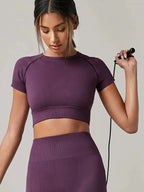 Women's seamless long-sleeve yoga and gym top with compression fit