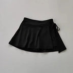 Women's high-waist pleated tennis and padel skirt with built-in compression shorts