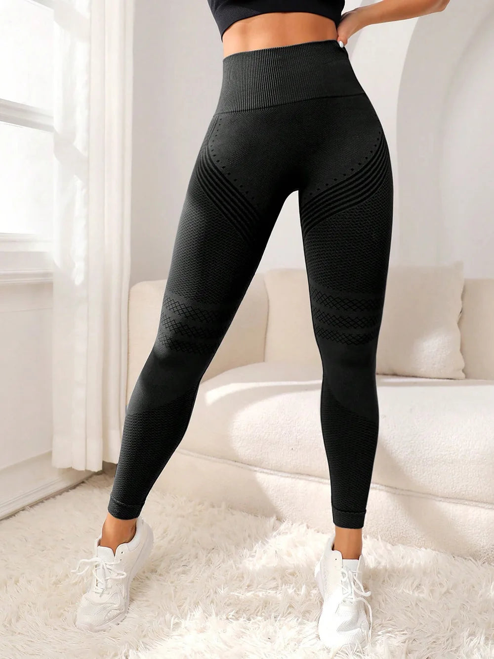 Women's high-waist fitness leggings with contour sculpting lines, push-up fit