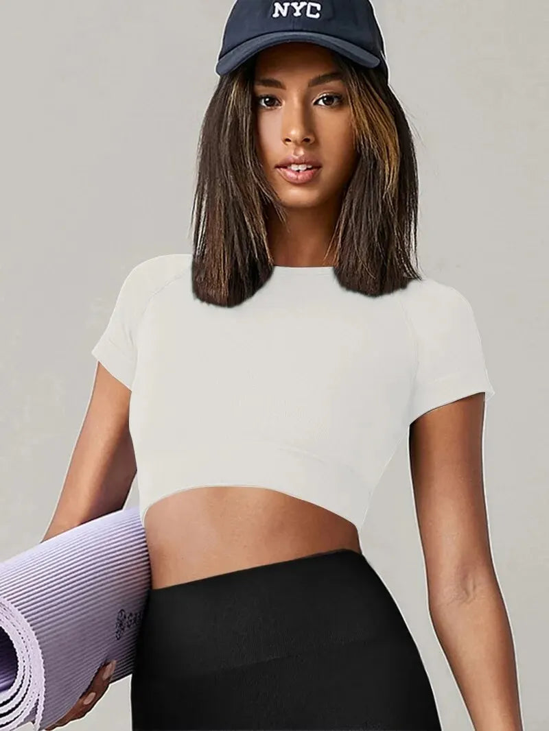 Women's seamless long-sleeve yoga and gym top with compression fit