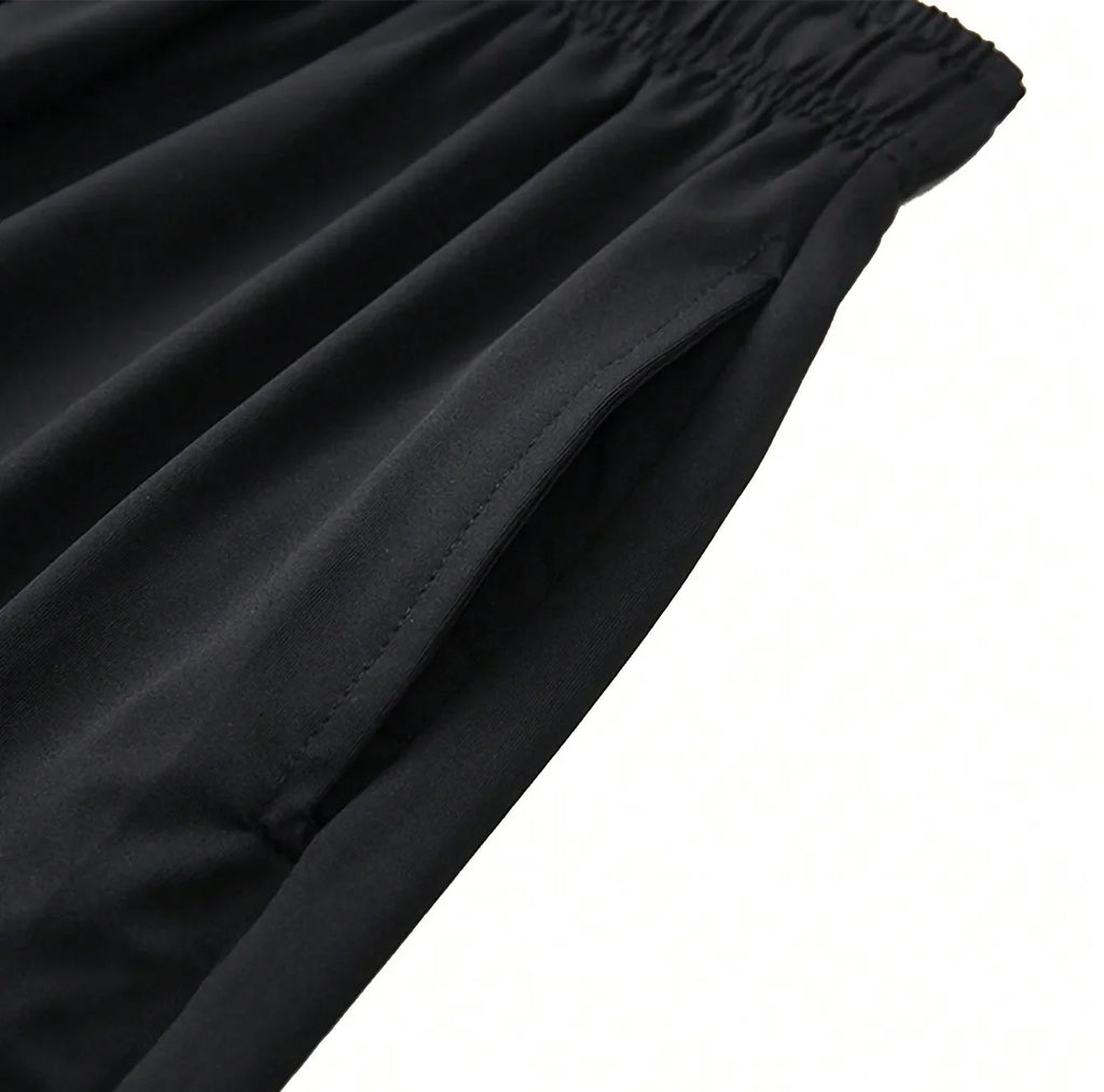 Men's 2-in-1 training pants with built-in compression liner and tapered ankle