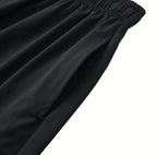 Men's 2-in-1 training pants with built-in compression liner and tapered ankle