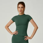 Women's seamless gym crop top with built-in light support bra and removable pads