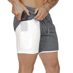 Men's 2-in-1 training shorts with outer layer and built-in compression liner