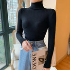 Women's ribbed knit turtleneck sweater, fitted with long sleeves