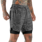 Men's 2-in-1 training shorts with outer layer and built-in compression liner